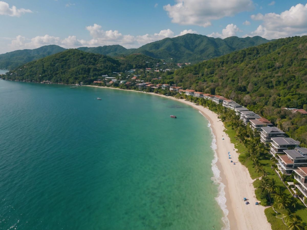 Aerial view of Phuket's luxury real estate along the coastline, highlighting the recent property boom.
