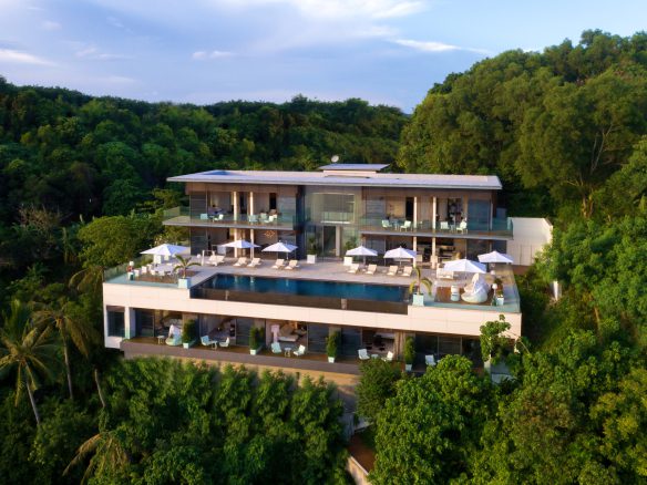 Peaceful villa retreat with private pool and green landscape.