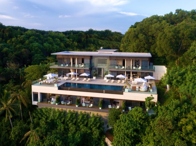 Peaceful villa retreat with private pool and green landscape.