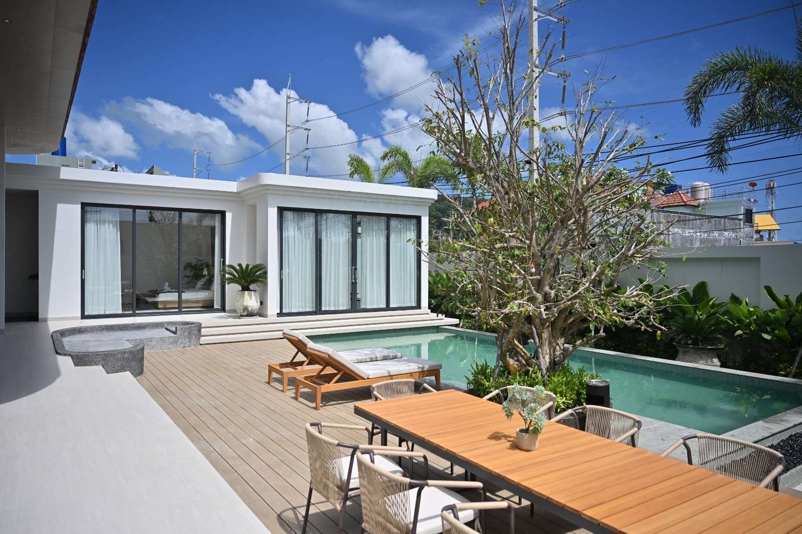 Luxury villa with a private pool and lush tropical garden.