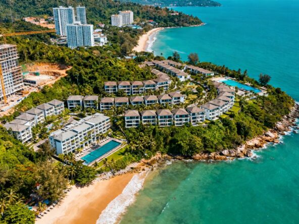 Phuket coastline with luxury resorts and new construction.