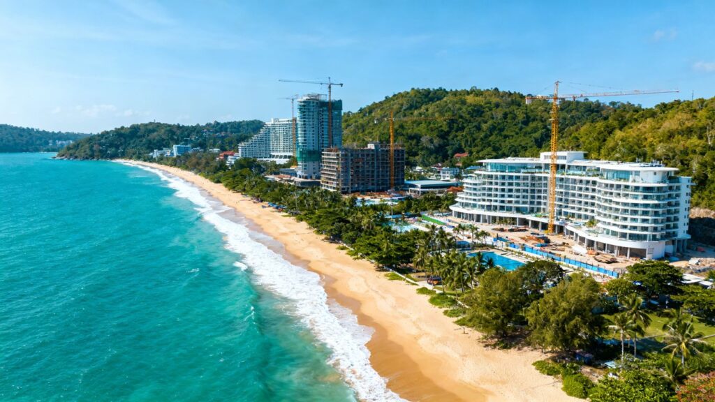 Phuket coastline with beaches, resorts, and construction.