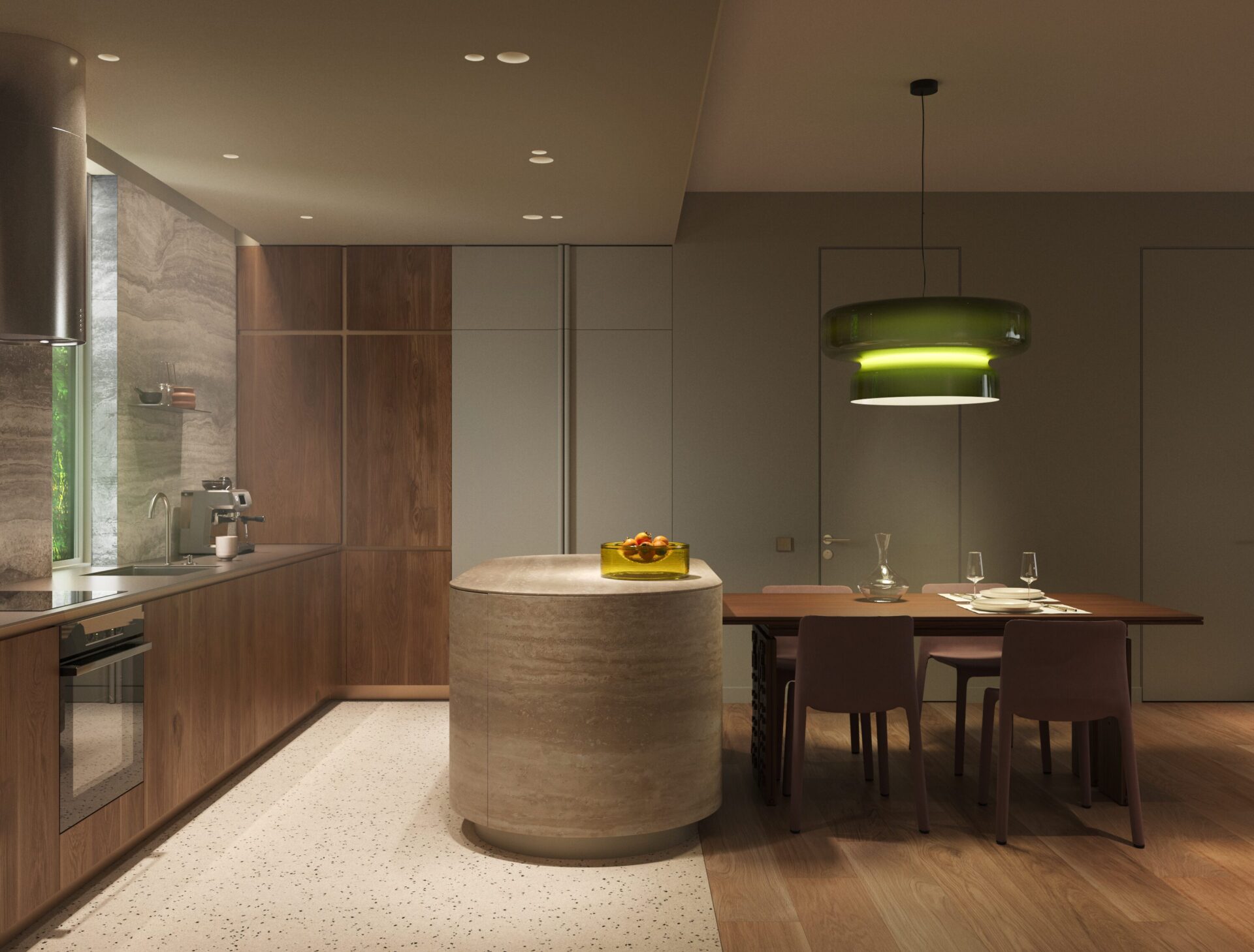 Modern kitchen with wood cabinets, an island, and a large green pendant light over a dining table set for four to six people in warm lighting.