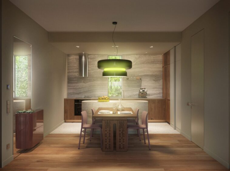 Modern open-plan dining area with a wooden table, purple chairs, and a green pendant light over a marble kitchen island.