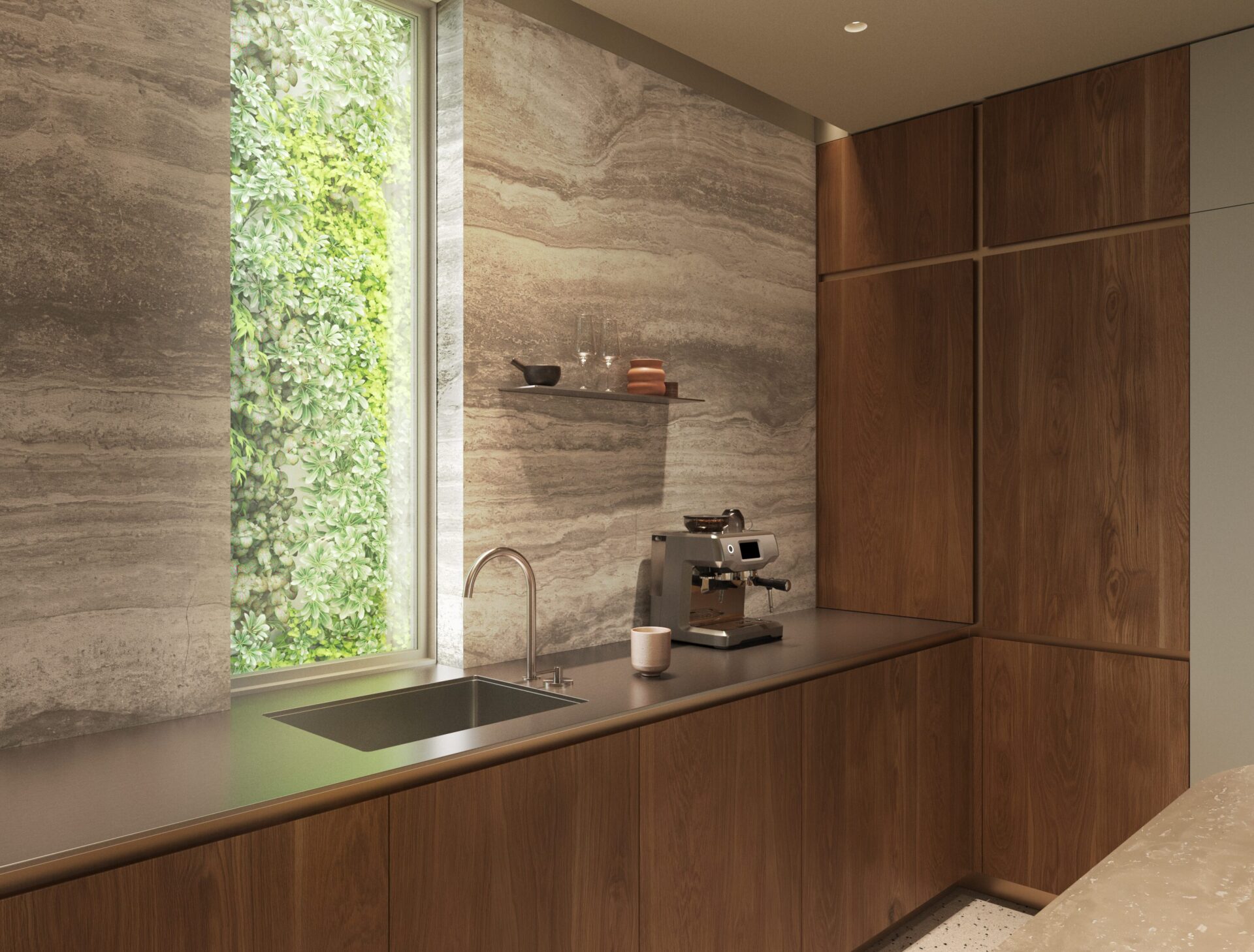Modern kitchen with wood cabinets, gray countertop, and a vertical green plant wall beside a window; espresso machine and glassware on a shelf above the counter.