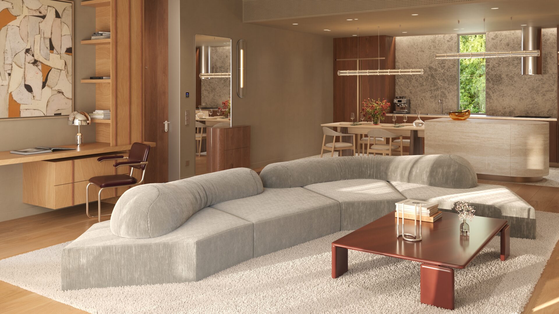 Open-concept living room with a large gray sectional on a white shag rug, a wooden coffee table, a desk and shelves, and a warm wood-toned kitchen and dining area in the background.