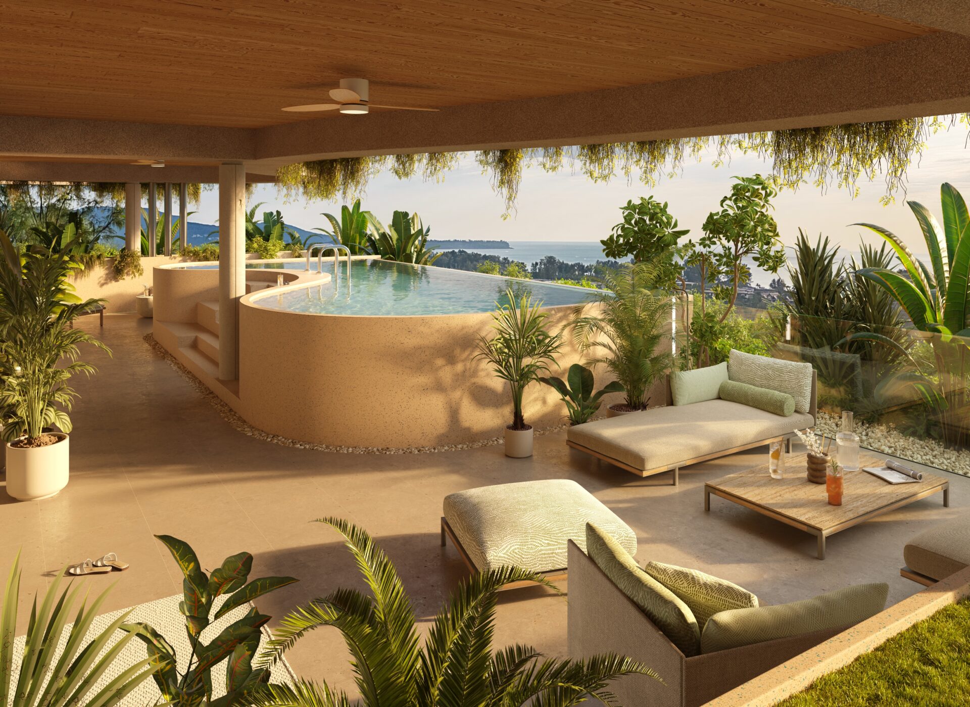 Sunlit outdoor lounge with a curved infinity pool, beige seating, and lush tropical plants overlooking the coastline and distant hills.