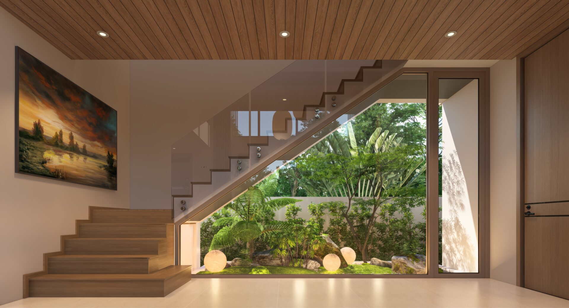 Modern interior with wooden staircase leading to a glass-walled courtyard garden visible through large windows and a glass railing reflecting greenery above- staircase wall art on left; warm wood ceiling panels.