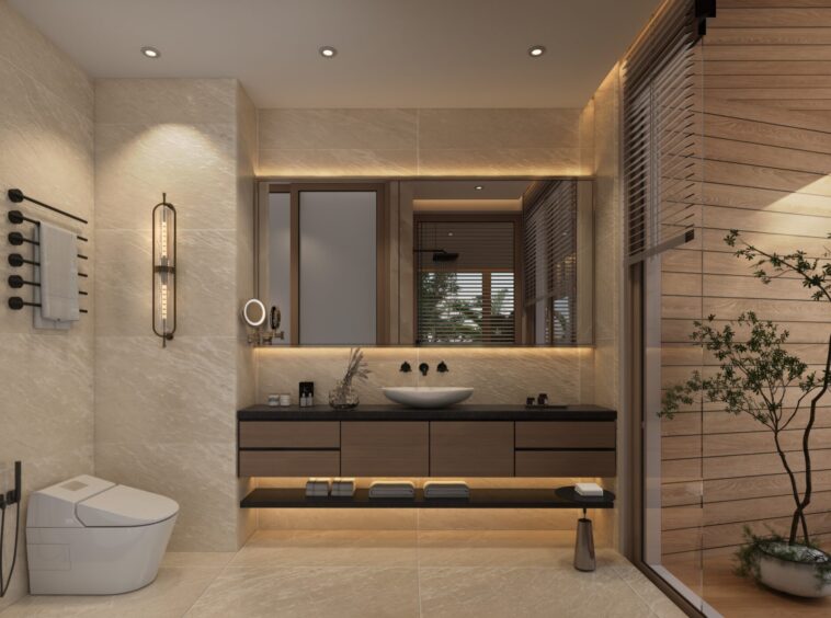 Modern bathroom with a wall-mounted wood vanity, oval sink, and large mirror, beige stone tiles, and warm under-cabinet lighting.