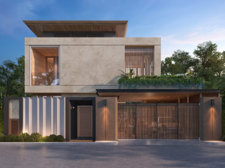 Modern two‑story concrete house with wooden accents, a gated entrance, and greenery along a low wall at the front.
