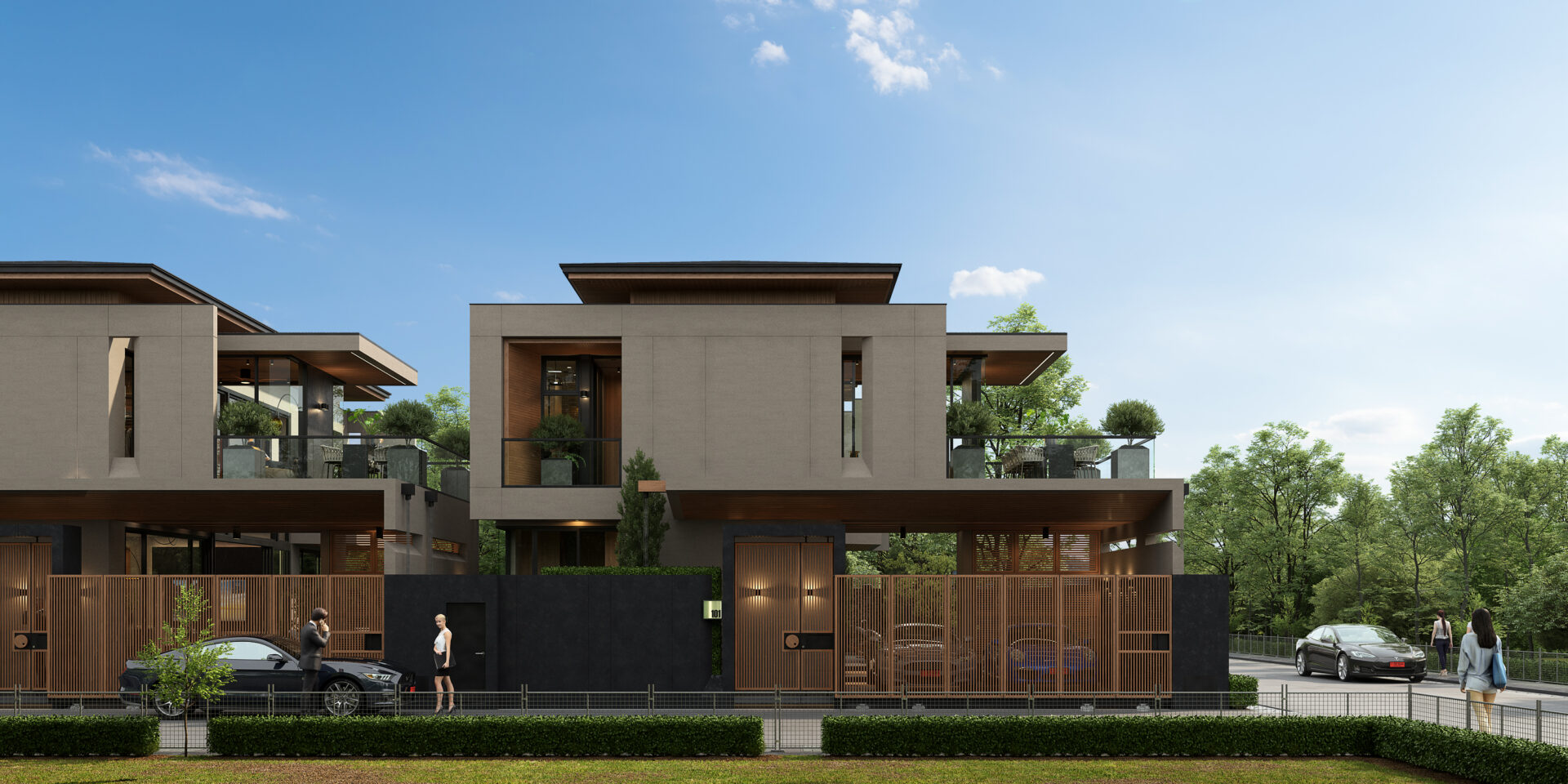 Modern multi-story residential building with a gray stone facade, wooden accents, balconies, and a gated entrance.