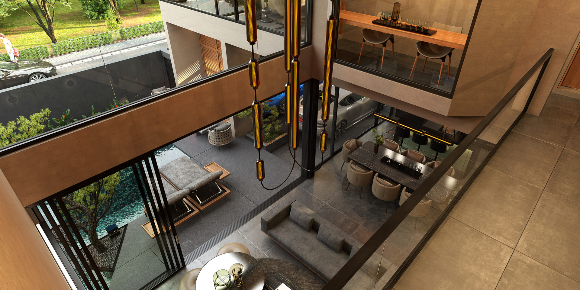 Spacious modern atrium with amber pendant lights, glass railings, and two-level living areas with a dining table and lounge seating.