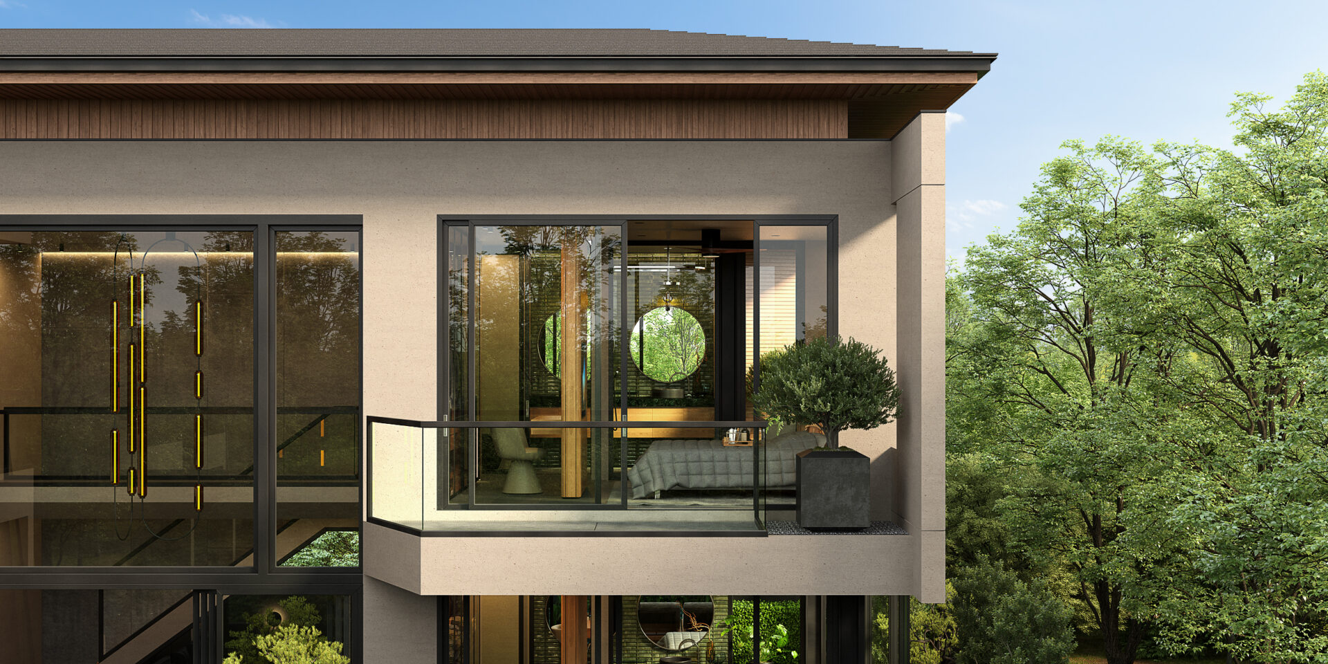 Contemporary apartment balcony with glass railing and greenery, showing a living space inside with a circular window view of trees outside.