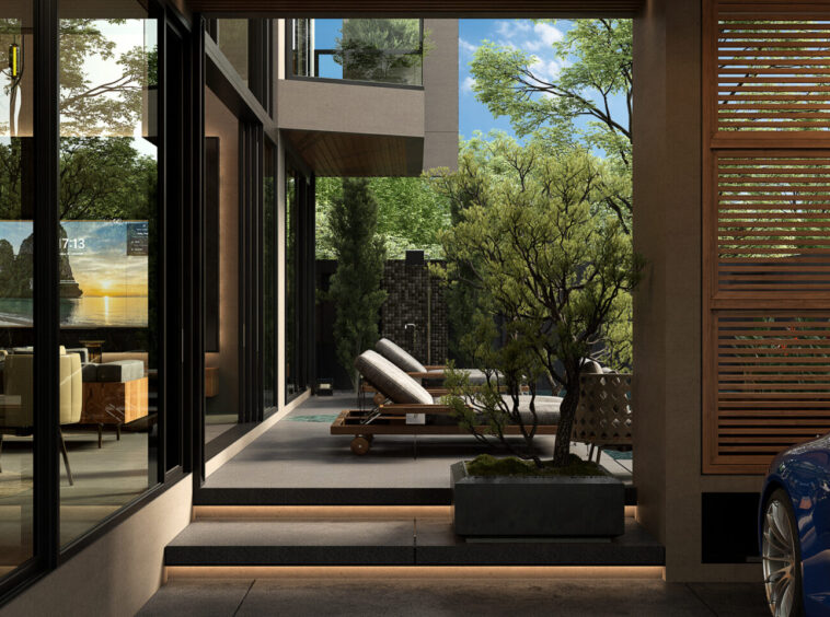 Modern courtyard with glass doors, outdoor lounge chairs, and a blue car at the edge of a wooden louvered screen area amidst greenery