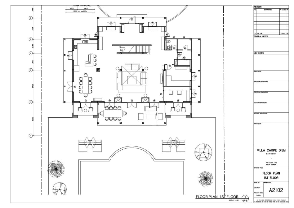 Architectural floor plan of a villa's first floor showing central living area, dining, kitchen, bedrooms, stairs, and surrounding rooms with outdoor terrace.